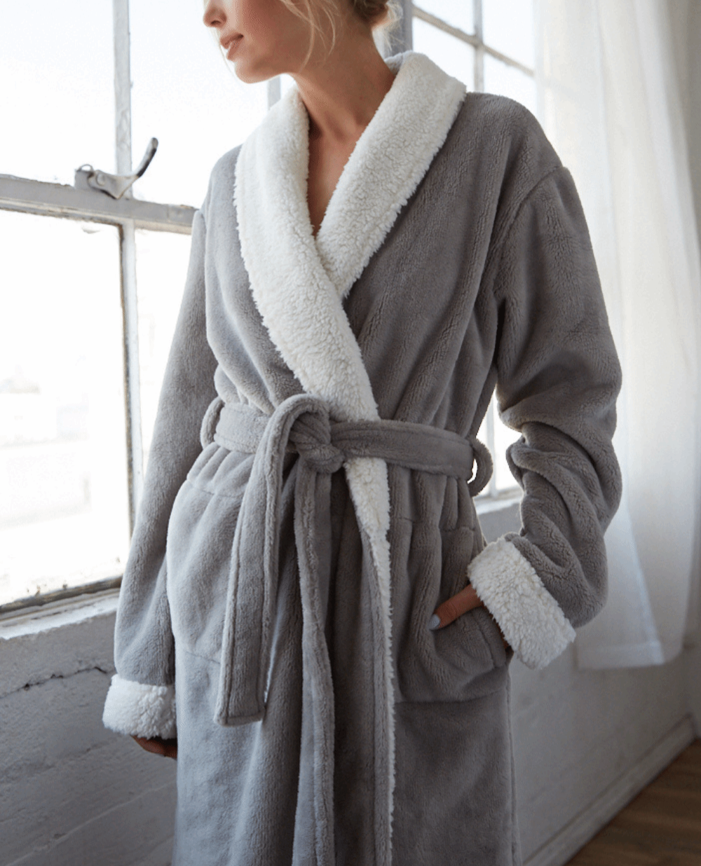 Woman wearing gray Cloud Soft Fleece Sherpa Bathrobe